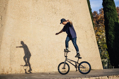 Man practicing tricks with the bmx bike in the city