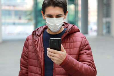 Young man using mobile phone