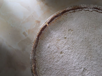 Directly above view of flour in plate on table