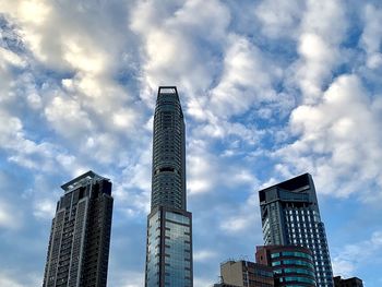 Low angle view of skyscrapers against sky