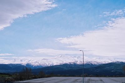 Scenic view of mountains against sky during winter