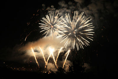 Firework display at night