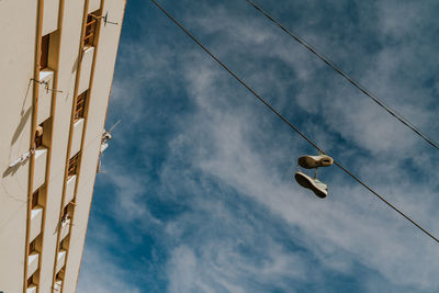 Low angle view of street light against sky