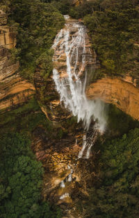 High angle view of waterfall in forest