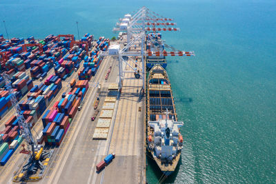 High angle view of commercial dock by sea