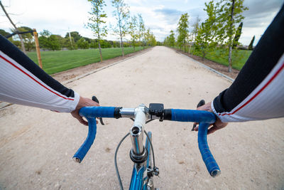 Close-up of bicycle on road