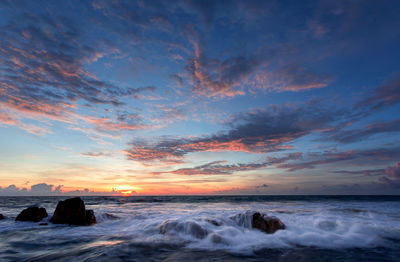 Scenic view of sea against sky during sunset