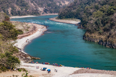 High angle view of people on the banks of ganga river in rishikesh, india