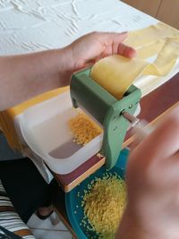 High angle view of woman preparing food