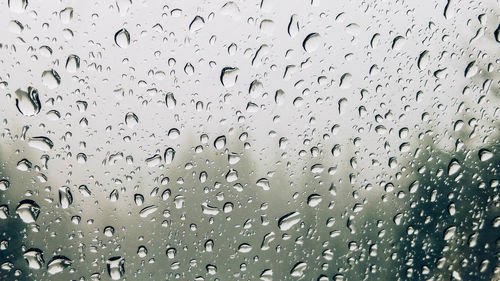 Close-up of water drops on glass