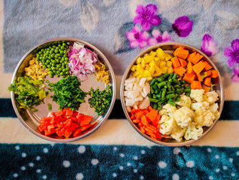 High angle view of chopped vegetables in bowl on table