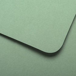 High angle view of paper against green background