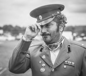 Portrait of man wearing mask standing outdoors