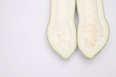 High angle view of bread on white background