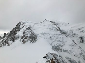 Scenic view of snow covered mountain against sky on mont blanc