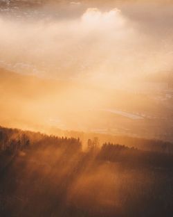 Scenic view of landscape against sky during sunset