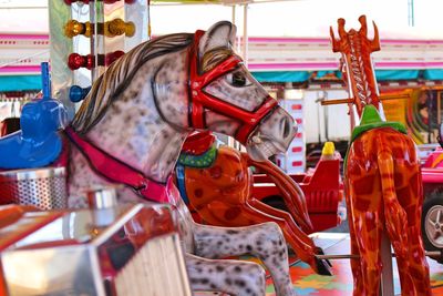 Close-up side view of merry-go-round