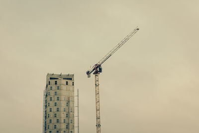 Modern buildings under construction, a cold and sad atmosphere