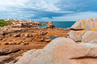 Rocky seascape in pink granite coast around perros-guirec in brittany, france