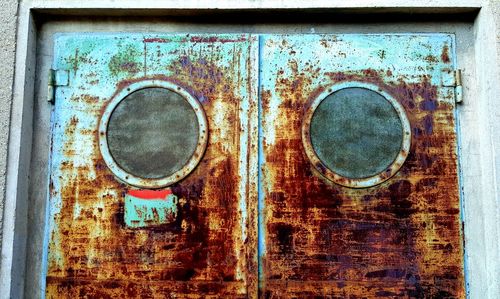 Close-up of old rusty metal door