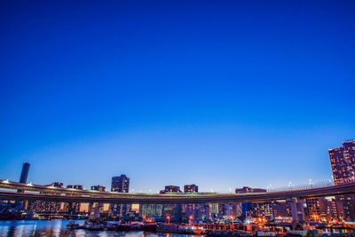 Low angle view of buildings against blue sky