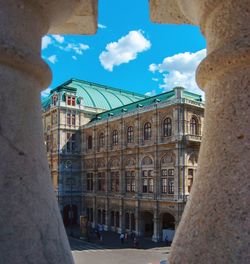 Buildings in city against sky