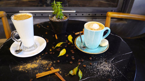 Close-up of coffee cup on table