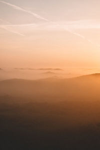 Scenic view of landscape against sky during sunset