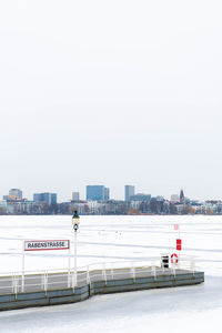 Scenic view of city against clear sky