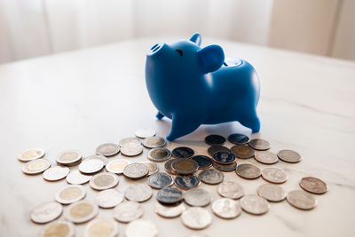 Close-up of coins on table