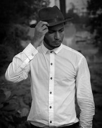 Portrait of young man looking away