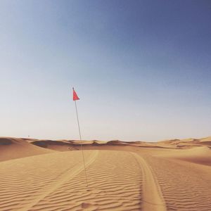 Scenic view of desert against clear sky