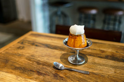 Close-up of coffee cup on table