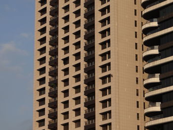 Low angle view of modern building against sky