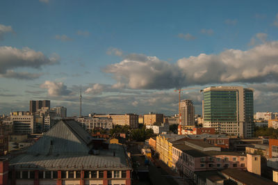 High angle view of buildings in city against sky