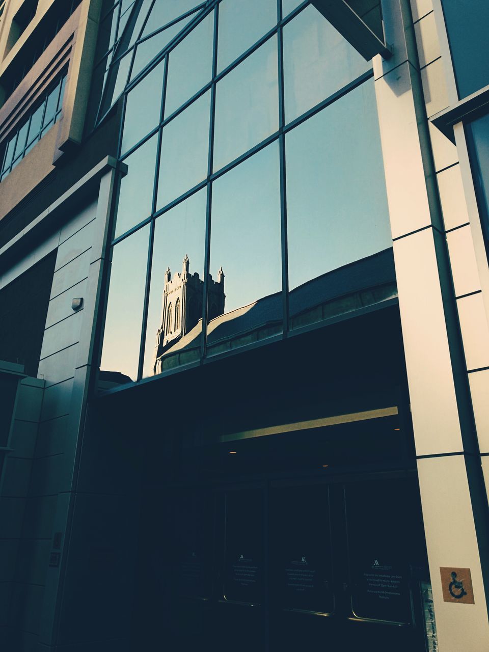 LOW ANGLE VIEW OF BUILDINGS AGAINST CLEAR SKY