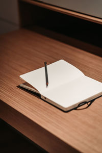 High angle view of book on table