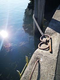 High angle view of rope tied on boat