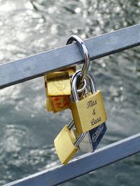 Close up of padlocks on railing