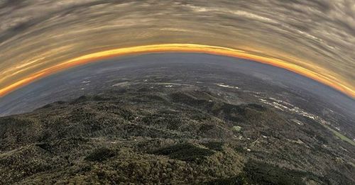 Scenic view of landscape at sunset