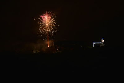 Firework display at night