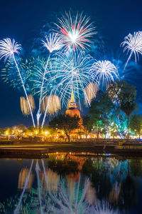 Firework display at night