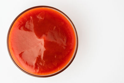 High angle view of drink against white background