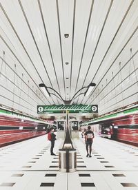 People at railroad station platform