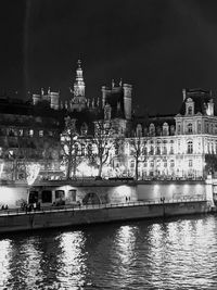 Illuminated buildings in city at night