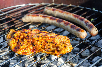 Close-up of meat on barbecue grill