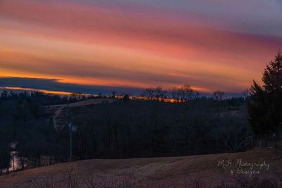 Scenic view of landscape against sky during sunset