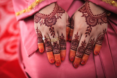 Henna is traditional malay decorative art. close-up.