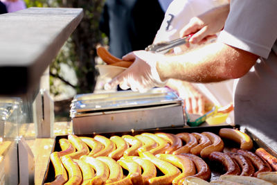 Close-up of man preparing food