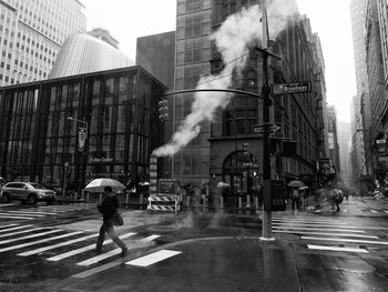 Blurred motion of man on street in city